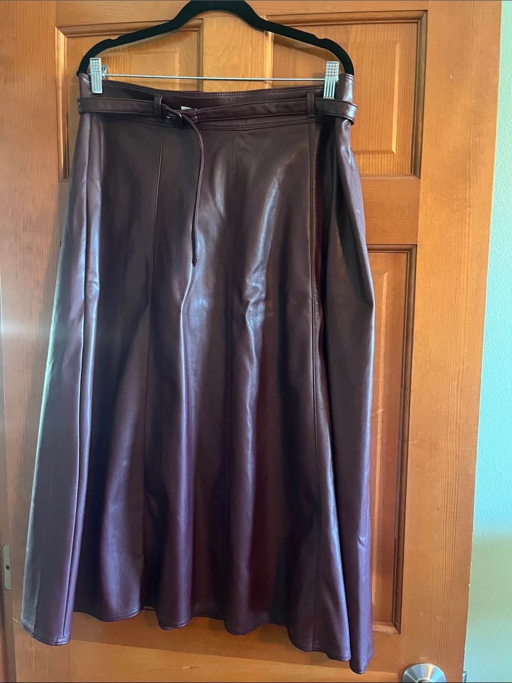 Ann Taylor Faux Leather A-Line Skirt in Burgundy with matching belt.